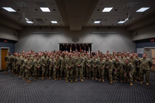 Chief Master Sergeant of the Space Force John Bentivegna poses with Space Force Detachment 1 after an all-call at the Powell Event Center, Goodfellow Air Force Base, Texas, Aug. 16, 2024. Bentivegna spoke on the role of the Space Force in the Department of Defense and how the current Guardians are shaping the identity and culture of the service. (U.S. Air Force photo by Airman 1st Class Brian Lummus)