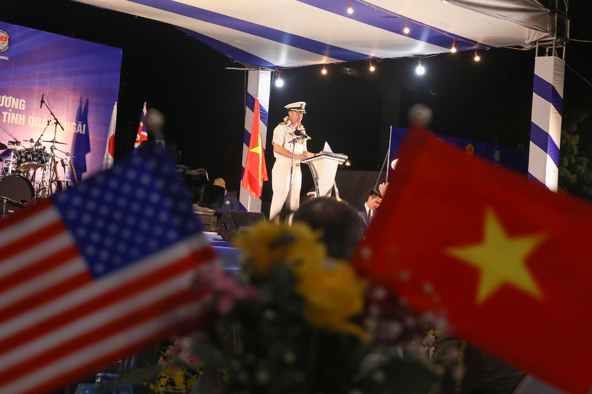 QUANG NGAI, Vietnam (Aug. 20, 2024) - U.S. Navy Capt. Daniel Keeler, Pacific Partnership 2024-2 (PP24-2) mission commander, speaks at the opening ceremony of PP24-2 and Pacific Angel 2024-3 at Pham Van Dong Square in Quang Ngai, Vietnam, Aug. 20, 2024.