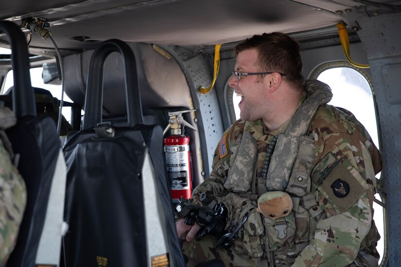 Soldiers of the 2-147th Assault Helicopter Battalion, 63rd Theater Aviation Brigade, perform a helocast demonstration as part of the Thunder Over Louisville’s Air Show in Louisville, Kentucky, April 20, 2024.