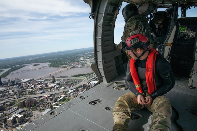 Soldiers of the 2-147th Assault Helicopter Battalion, 63rd Theater Aviation Brigade, perform a helocast demonstration as part of the Thunder Over Louisville’s Air Show in Louisville, Kentucky, April 20, 2024.