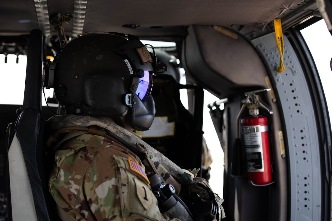 Soldiers of the 2-147th Assault Helicopter Battalion, 63rd Theater Aviation Brigade, perform a helocast demonstration as part of the Thunder Over Louisville’s Air Show in Louisville, Kentucky, April 20, 2024.