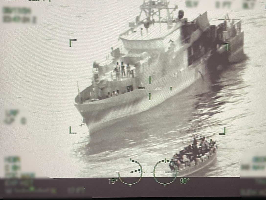 The crew of Coast Guard Cutter Paul Clark interdicting a migrant venture 57 miles south of Turks and Caicos Islands August 17, 2024. The crew embarked all 182 Haitian migrants for disposition.