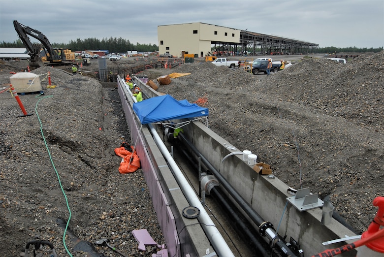 Shown here is part of a three-mile underground concrete utility corridor, known as a utilidor, where one mile was upgraded, and two miles were constructed. The system now provides steam, condensate and water to facilities at the new F-35 complex.