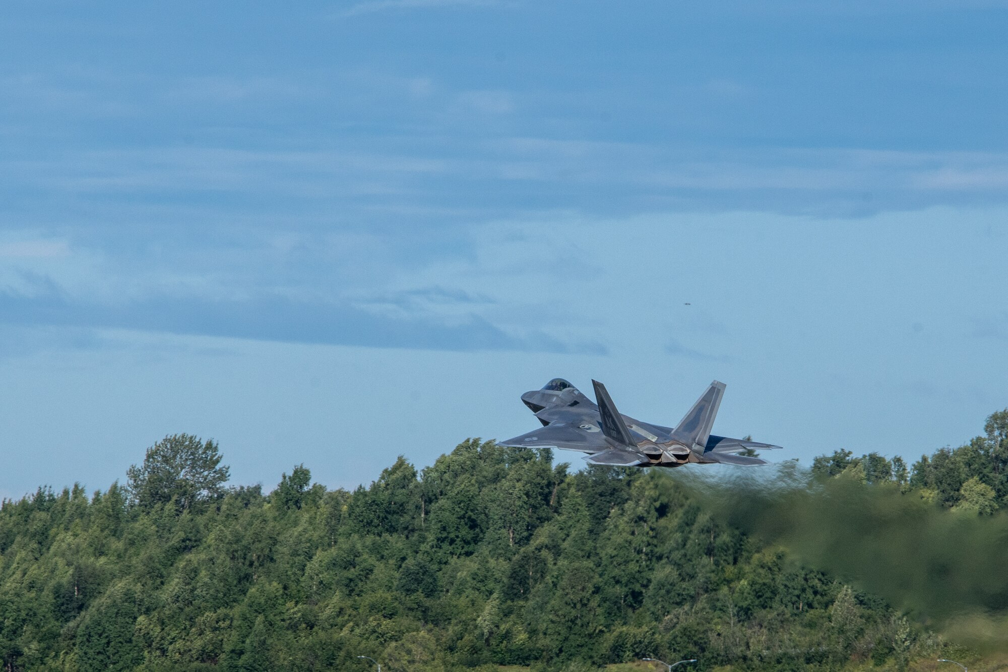 A F-22 Raptor takes off at Joint Base Elmendorf-Richardson, Alaska