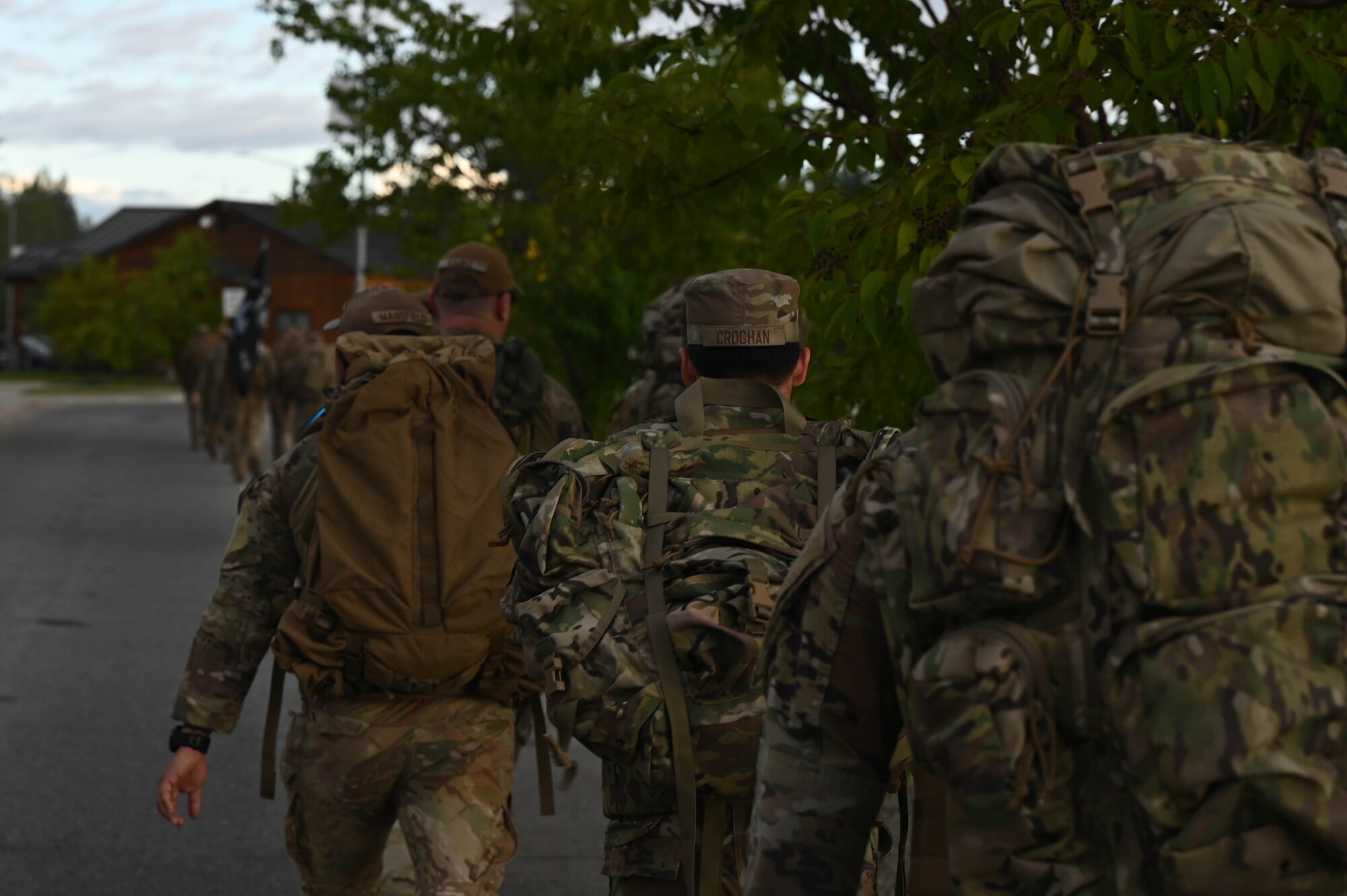 Airmen assigned to the 354th Civil Engineer Squadron march in the arctic memorial ruck at Eielson Air Force Base, Alaska, Aug. 16, 2024.