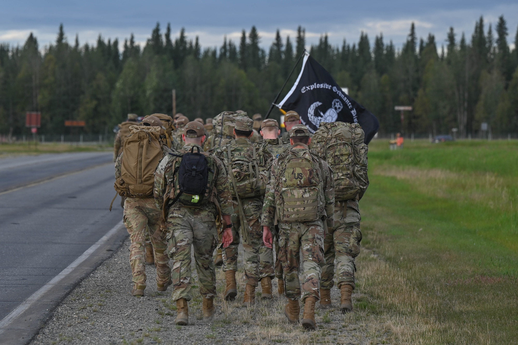 Airmen assigned to the 354th Civil Engineer Squadron march in the arctic memorial ruck at Eielson Air Force Base, Alaska, Aug. 16, 2024.