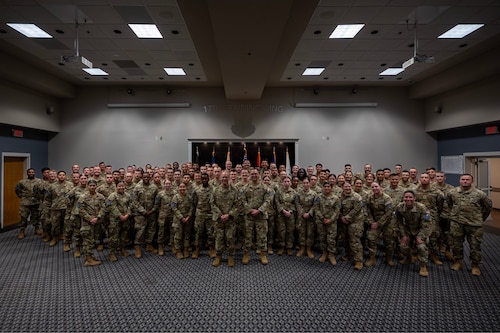 Chief Master Sergeant of the Space Force John Bentivegna poses with Space Force Detachment 1 after an all-call at the Powell Event Center, Goodfellow Air Force Base, Texas, Aug. 16, 2024. Bentivegna spoke on the role of the Space Force in the Department of Defense and how the current Guardians are shaping the identity and culture of the service. (U.S. Air Force photo by Airman 1st Class Brian Lummus)