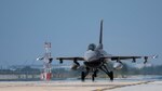 A U.S. Air Force F-16 Fighting Falcon aircraft, assigned to the 80th Fighter Squadron, taxis back after landing at Kunsan Air Base, Republic of Korea.