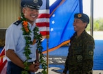 Filipino Army Air Traffic Controller and recently graduated Defense Language Institute English Language Center student, First Lieutenant Febe Salina Acenas, connects with her cousin, Lt. Col. Matthew Redaja, at his change of command ceremony at Joint Base San Antonio-Lackland, Texas, June 10, 2024