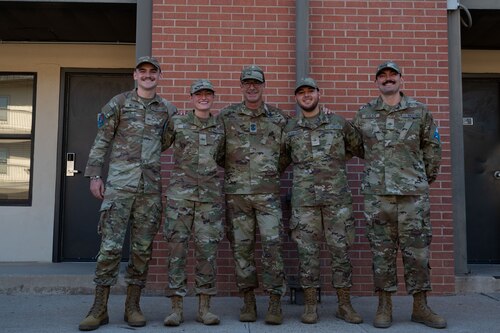 Chief Master Sergeant of the Space Force John Bentivegna poses with Space Force Detachment 1 students at Goodfellow Air Force Base, Texas, Aug. 16, 2024. Bentivegna spoke with the Guardians at Detachment 1 about their experiences at the detachment and where they will be going for their next assignments. (U.S. Air Force photo by Airman 1st Class Brian Lummus)