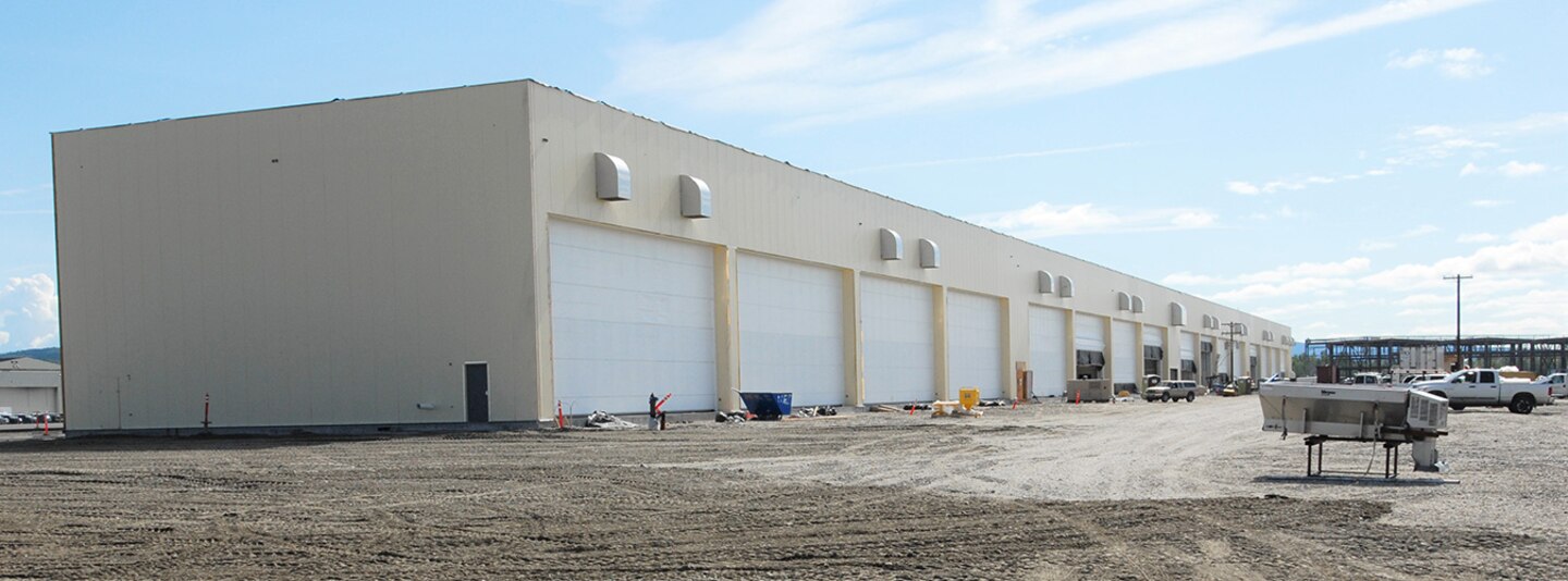 Shown here, USACE puts the final touches on a hangar complex for incoming F-35s to Eielson Air Force Base. The Department of Defense invested about $600 million on a beddown program at the installation located near North Pole, Alaska. Also known as the “joint strike fighter,” two new squadrons of 54 aircraft now have the proper facilities to support their missions thanks to the design and construction work of the U.S. Army Corps of Engineers – Alaska District.