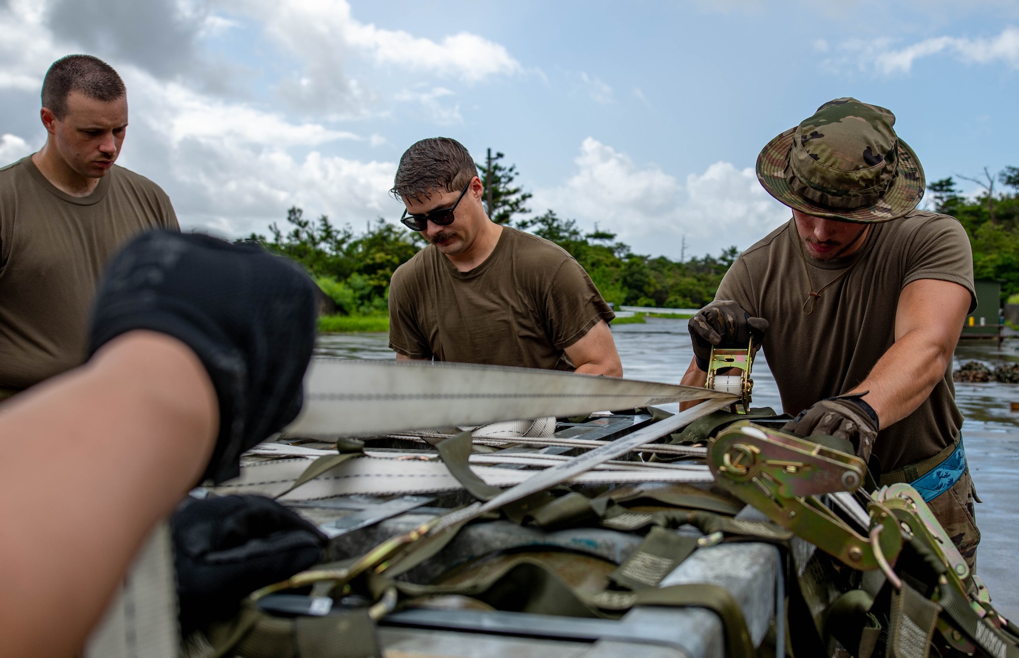 U.S. Air Force Airmen load munitions onto pallets during a tactical air-munitions rapid response package training at Kadena Air Base, Japan, Aug. 20, 2024.