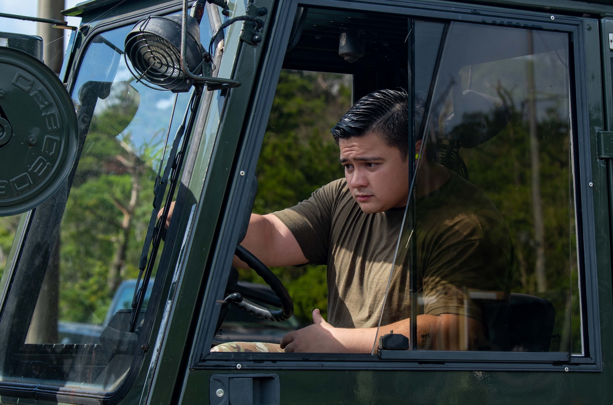U.S. Air Force Senior Airman Mason Arkell, 1st Special Operations Maintenance Squadron aero repair journeyman, drives a forklift during a tactical air-munitions rapid response package training at Kadena Air Base, Japan, Aug. 20, 2024.