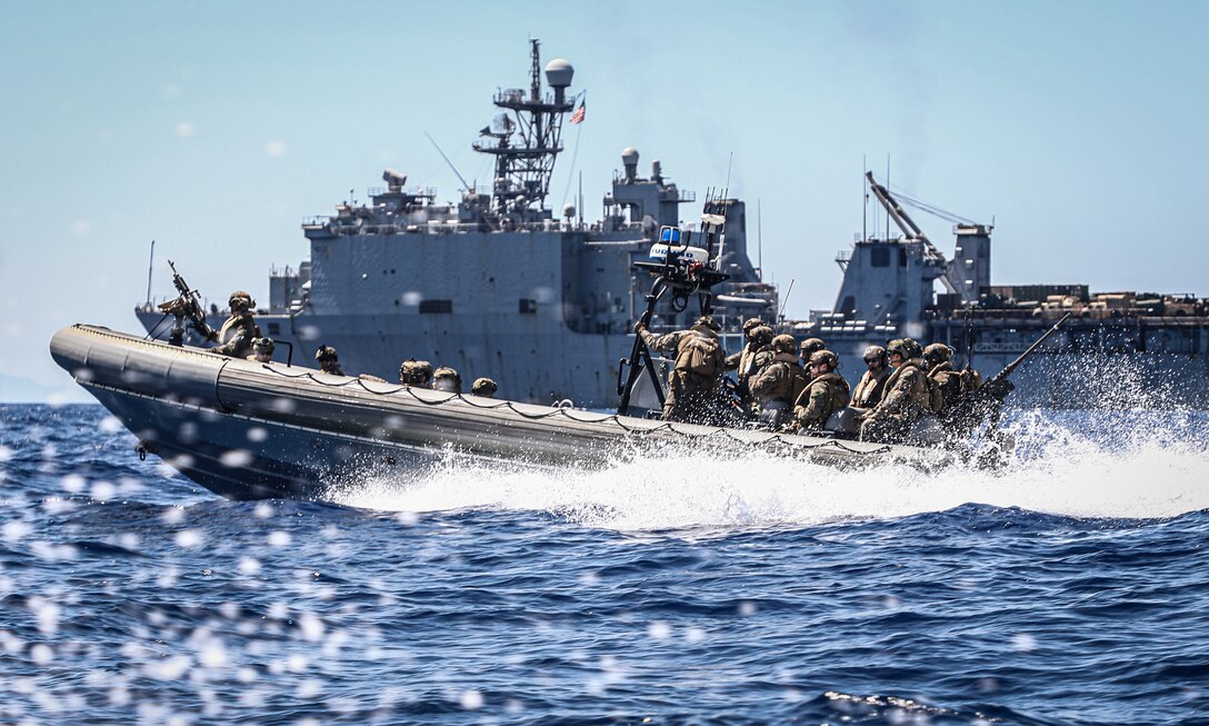 U.S. Marines with Battalion Landing Team 1/8, 24th Marine Expeditionary Unit (MEU) Special Operations Capable (SOC), conduct formation drills aboard a rigid-hull inflatable boat during small boat operations from the Harpers Ferry-class dock landing ship USS Oak Hill (LSD 51), while underway in the Mediterranean Sea, Aug. 9, 2024. The Wasp Amphibious Ready Group-24th MEU (SOC) is on a scheduled deployment to U.S. Naval Forces Europe and Africa area of operations to support U.S., Allied and partner interests in the region, including in the Eastern Mediterranean Sea, and to continue promoting regional stability and deterring aggression. (U.S. Marine Corps photo by Sgt. Jacqueline Peguero-Montes)