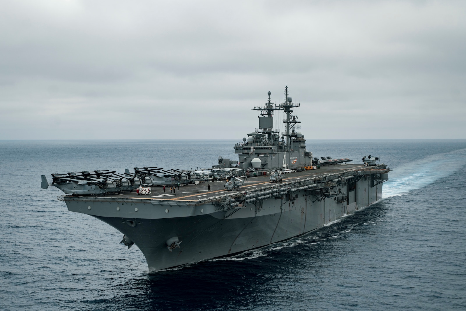 .The U.S. Navy amphibious assault ship USS Boxer (LHD 4) steams in the Pacific Ocean July 12, 2024. Elements of the 15th Marine Expeditionary Unit are currently embarked aboard the Boxer Amphibious Ready Group conducting routine operations in U.S. 3rd Fleet. (U.S. Marine Corps photo by Cpl. Amelia Kang)