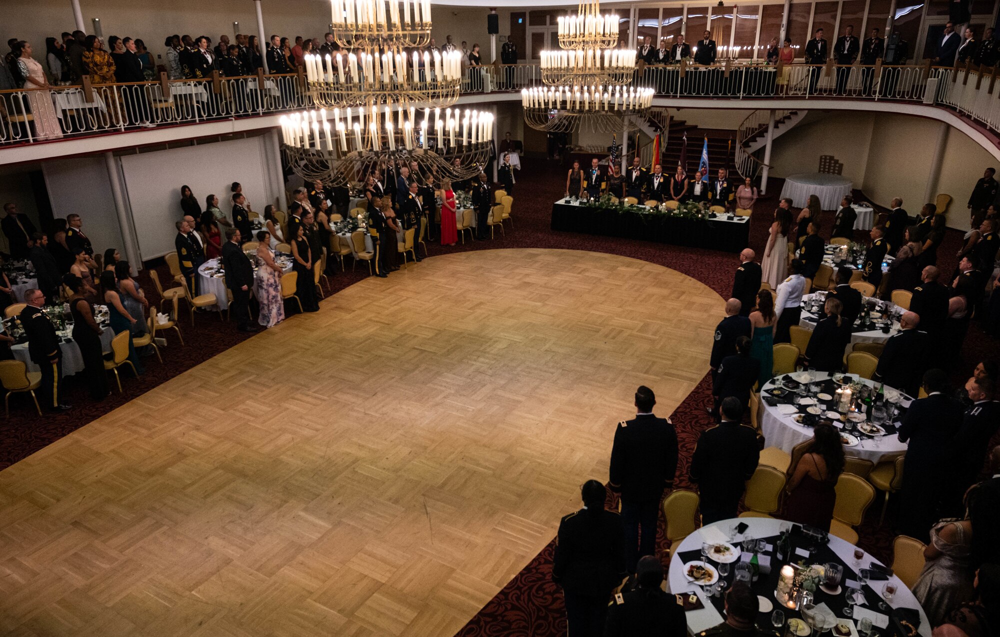 Guests of the Military Medicine Ball sing military songs at Vogelweh Military Complex, Germany, Aug. 21, 2024. Approximately 300 U.S. military service members from the U.S. Army, Air Force, Navy and Marines were at the ball for the purpose of celebrating over 200 years of military medicine. (U.S. Air Force Photo by Senior Airman Jared Lovett)