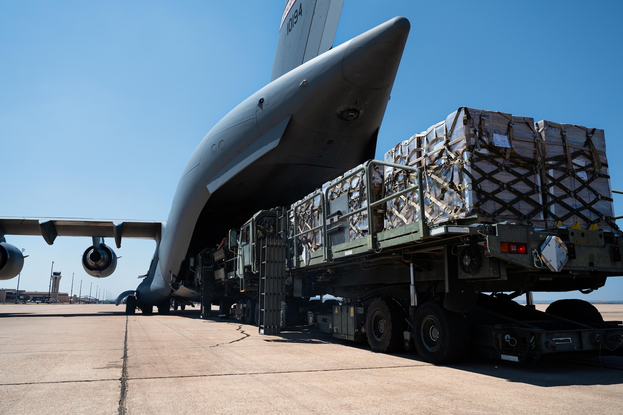Humanitarian cargo gets loaded onto a C-17 Globemaster from the 89th Airlift Squadron, Wright-Patterson Air Force Base, Ohio, at Dyess Air Force Base, Texas, Aug. 12, 2024. The 7th Logistics Readiness Squadron transported 40,000 pounds of rice for humanitarian aid in the Dominican Republic. The Dyess lift and strike mission is demonstrated by the 7th LRS’ global reach of cargo, which includes humanitarian relief to communities in need. (U.S. Air Force photo by Airman 1st Class Jade M. Caldwell)