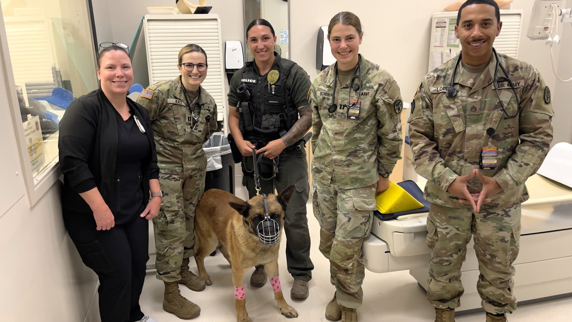 Thor and Taylor Purdy Pose with Radiology, Vet Staff