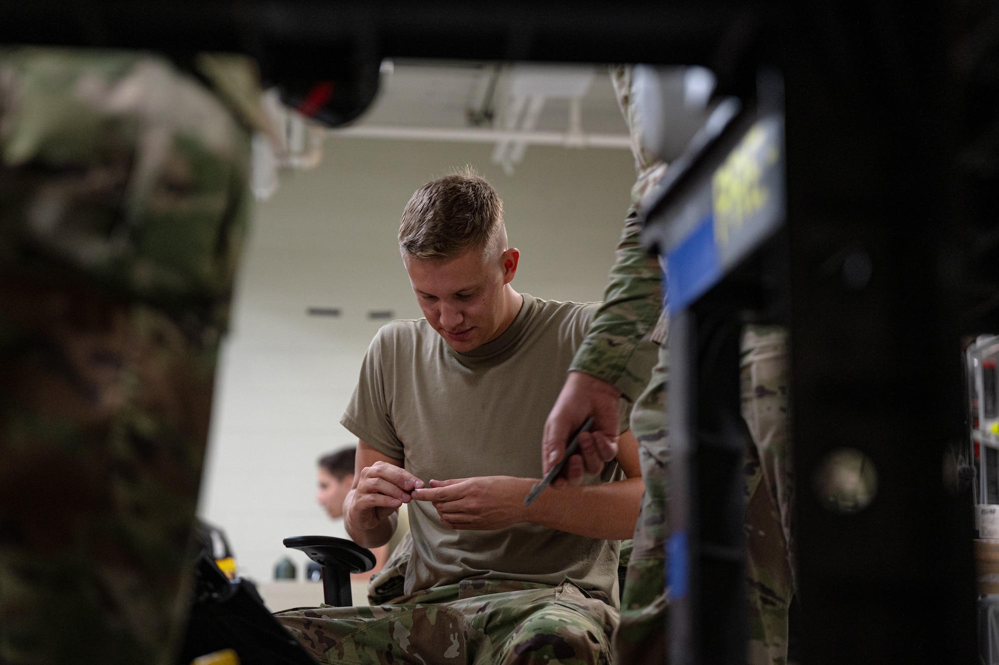 Airmen checks tools