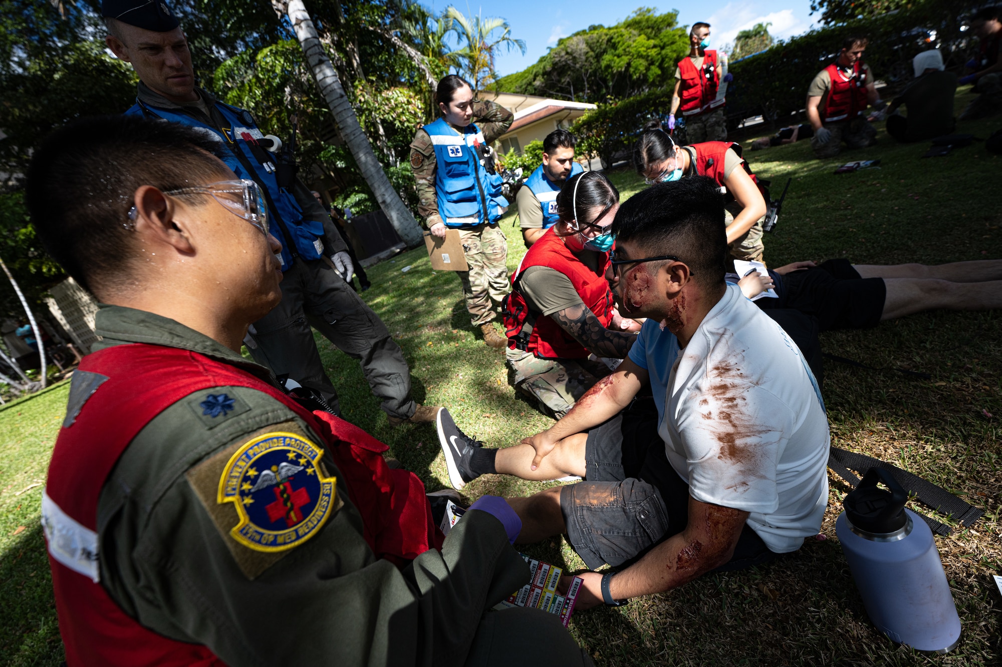 Airmen treats a simulated patient during an exercise.