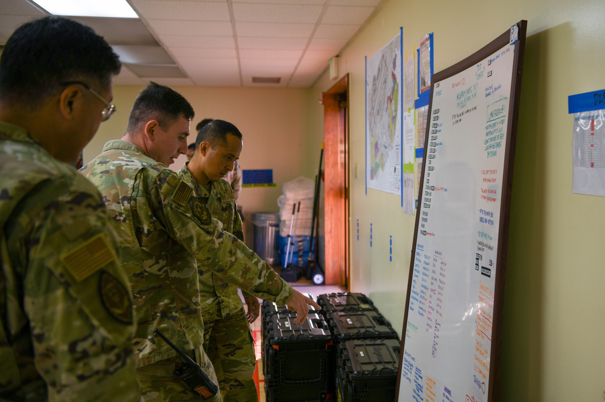Airmen discuss flight line operations.