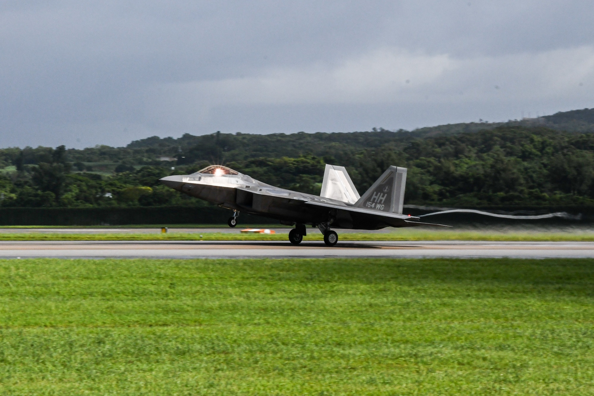 An F-22 Raptor departs Kadena.