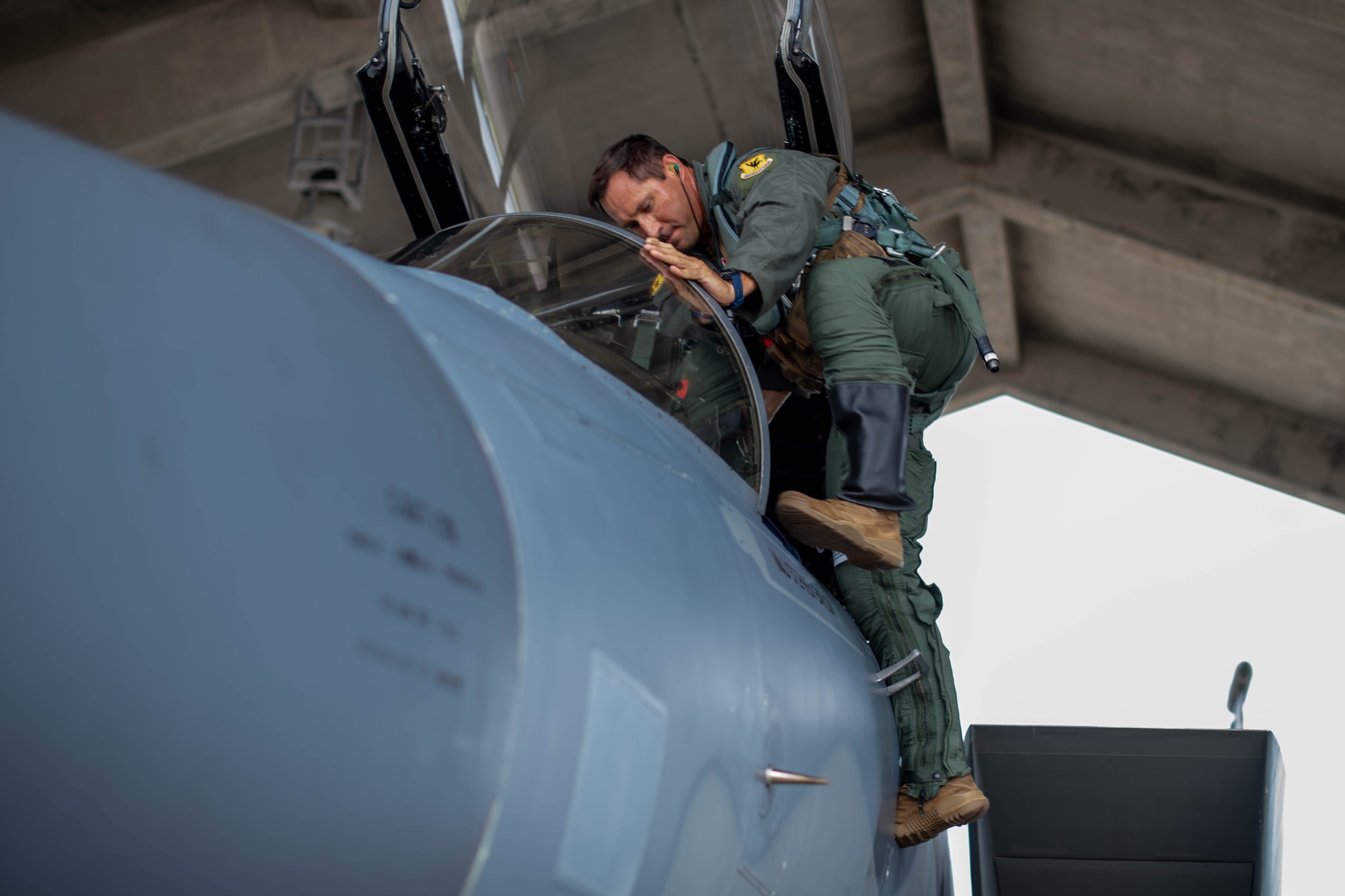 U.S. Air Force Maj. Peter Gawor, 67th Fighter Squadron director of operations, climbs aboard F-15C Eagle A5095 before its final flight and retirement at Kadena Air Base, Japan, Aug. 15, 2024.