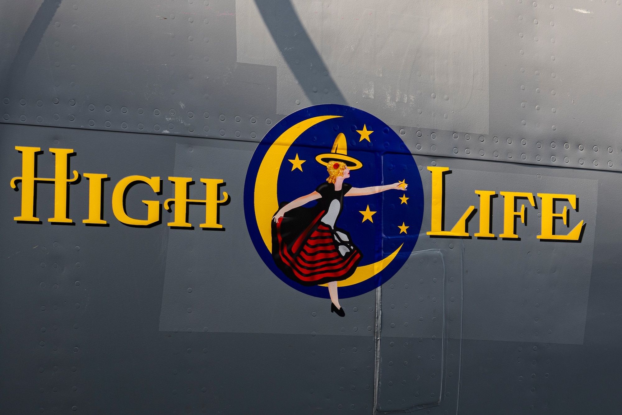 The new nose art of “High Life” is unveiled on a KC-135 Stratotanker assigned to the 100th Air Refueling Wing during a nose art dedication ceremony at Royal Air Force Mildenhall, England, Aug. 17, 2024. The B-17 Flying Fortress “High Life,” from which the KC-135 got its name, completed 12 successful missions before it crash-landed in Dübendorf, Switzerland, where the aircrew remained until the end of World War II. (U.S. Air Force photo by Senior Airman Alvaro Villagomez)