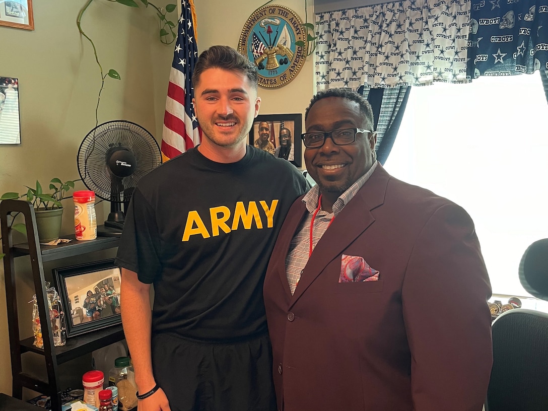 Sgt Russel Mendenhall (l) and Recovery Care Coordinator Kenneth Tate (R) at Fort Carson’s Soldier Recovery Unit