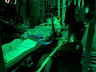 Sgt. Russel Mendenhall is life-flighted from Djibouti to a hospital in Saudi Arabia