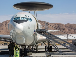 An E-3 Sentry undergoes preflight checks at Nellis Air Force Base, Nev., during Bamboo Eagle 24-3 on Aug. 8, 2024. These essential procedures ensure the aircraft’s readiness for its command and control mission, playing a vital role in the exercise's success by enabling real-time coordination and surveillance capabilities. (U.S. Air Force photo by Garrett N. Cole)