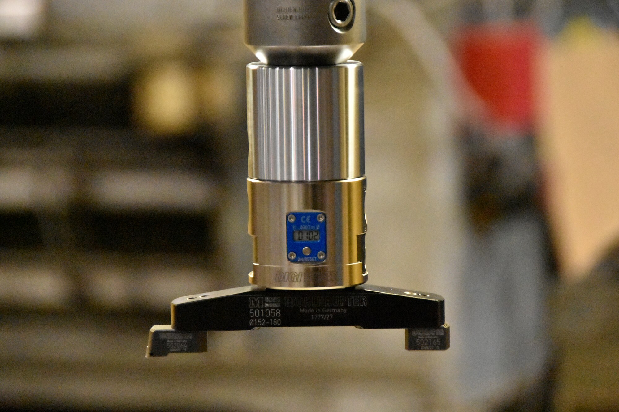 One of the new boring heads purchased by the Arnold Engineering Development Complex Model and Machine Shop at Arnold Air Force Base, Tenn., using innovation grant funding received in 2024 through the AEDC Spark Tank program is shown attached and ready for use July 30, 2024. The boring heads include technology that measures bored openings in equipment and features built-in digital readouts which allow machinists to quickly see whether a hole meets required specifications. Before the acquisition of these new boring heads, an indicator had to be placed on the bored equipment and a read-out obtained manually. (U.S. Air Force photo by Bradley Hicks)