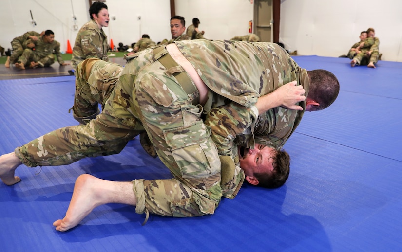 Approximately 30 U.S. Army Soldiers with the Pennsylvania National Guard participate in a five-day Army Combatives training program August 12-16 at Fort Indiantown Gap. Army Combatives trains leaders and Soldiers in close quarters combat to instill the Warrior Ethos and prepare Soldiers to defeat the enemy in hand-to-hand combat. (U.S. Army National Guard photo by Sgt. 1st Class Zane Craig)