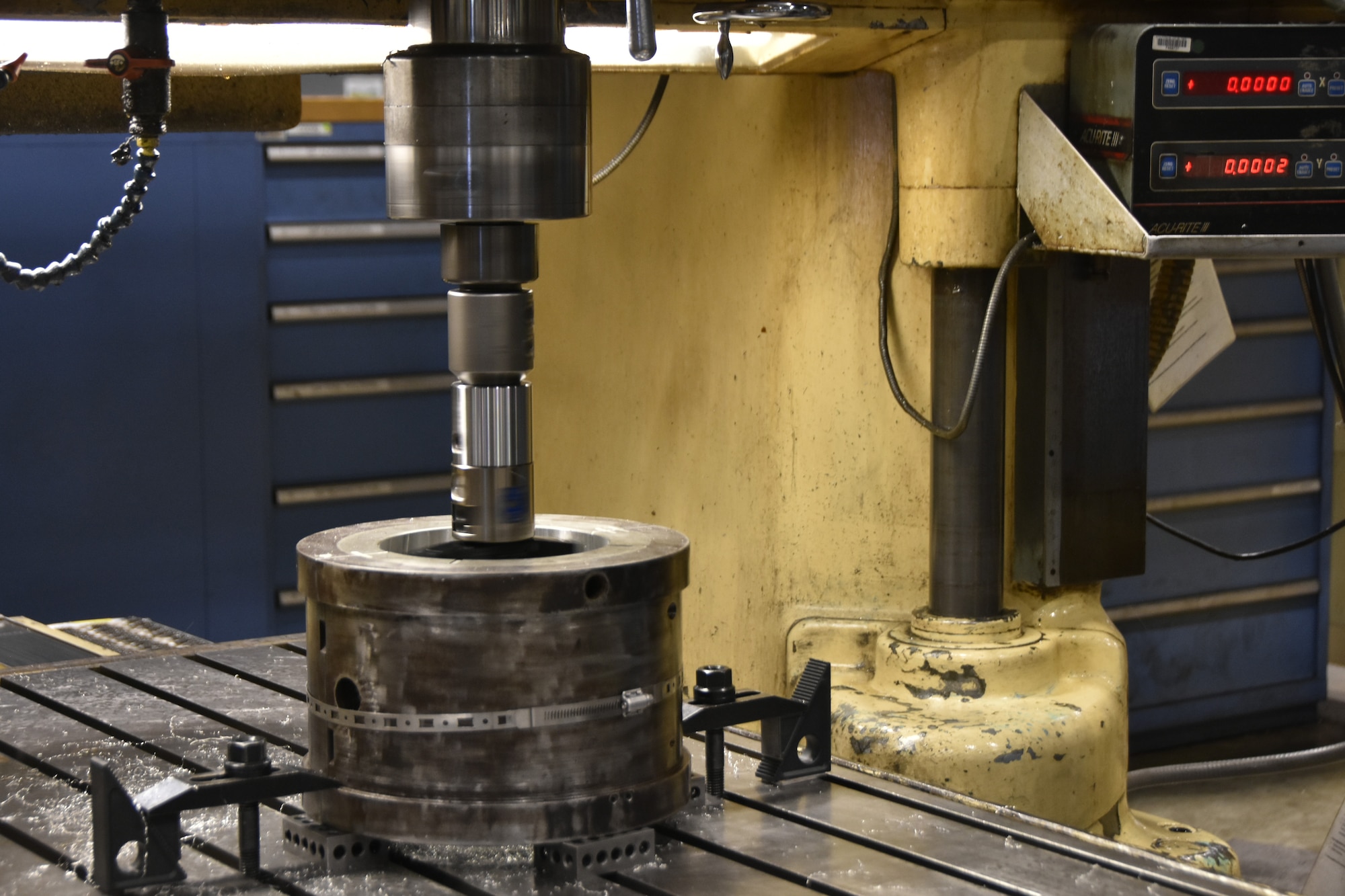 One of the new boring heads purchased by the Arnold Engineering Development Complex Model and Machine Shop at Arnold Air Force Base, Tenn., using innovation grant funding received in 2024 through the AEDC Spark Tank program bores a piece of equipment July 30, 2024. The boring heads include technology that measures bored openings in equipment and features built-in digital readouts which allow machinists to quickly see whether a hole meets required specifications. Before the acquisition of these new boring heads, an indicator had to be placed on the bored equipment and a read-out obtained manually. (U.S. Air Force photo by Bradley Hicks)
