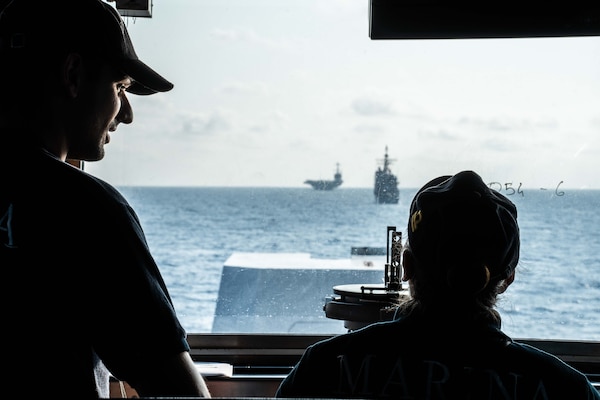 Sailors stand bridge watch in the pilot house