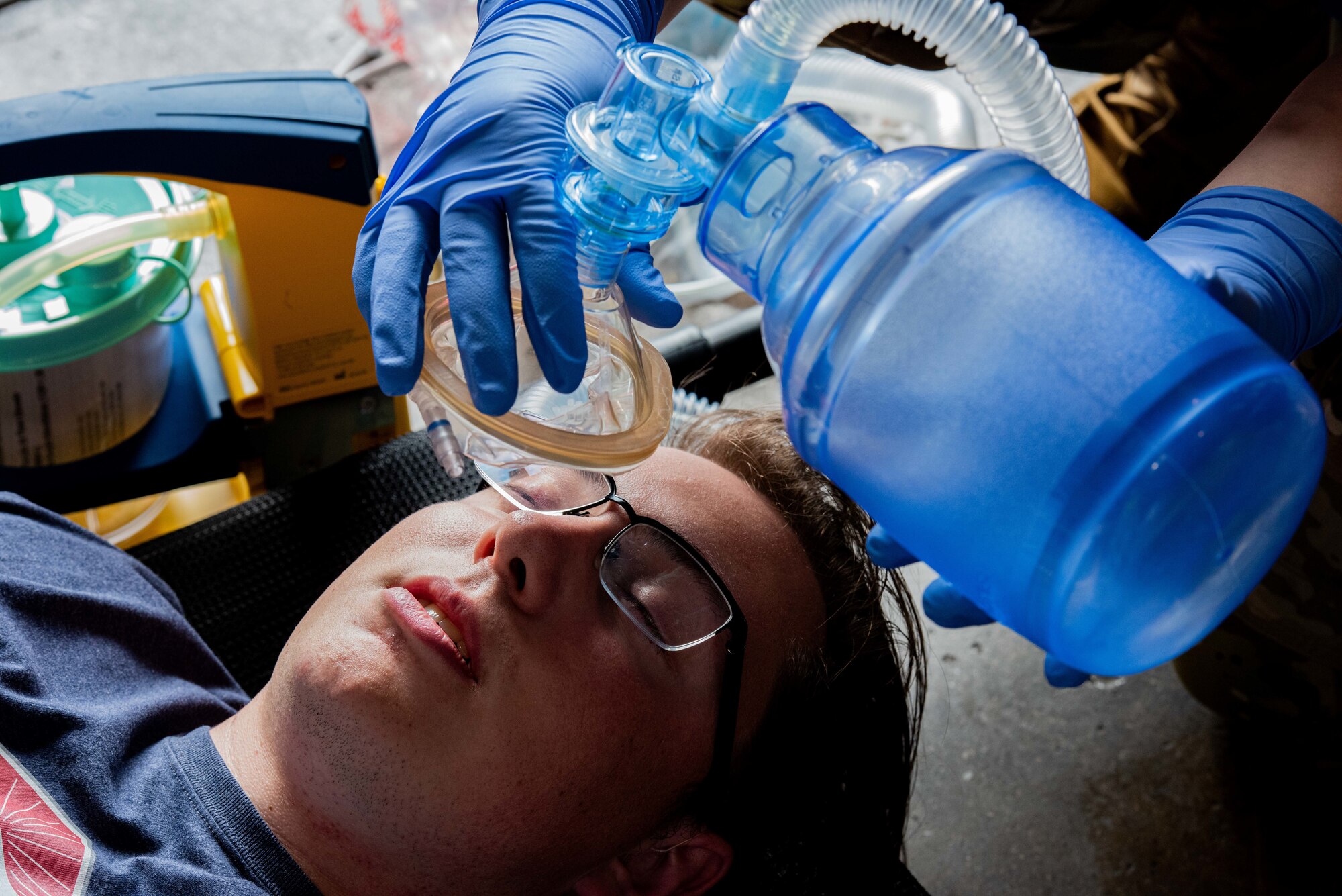A simulated casualty receives medical treatment during a major accident response exercise (MARE) at Minot Air Force Base, North Dakota, Aug. 21, 2024. The realistic training opportunities provided by MAREs enhance readiness for first responders in the event of a real-world incident. (U.S. Air Force photo by Senior Airman Kyle Wilson)