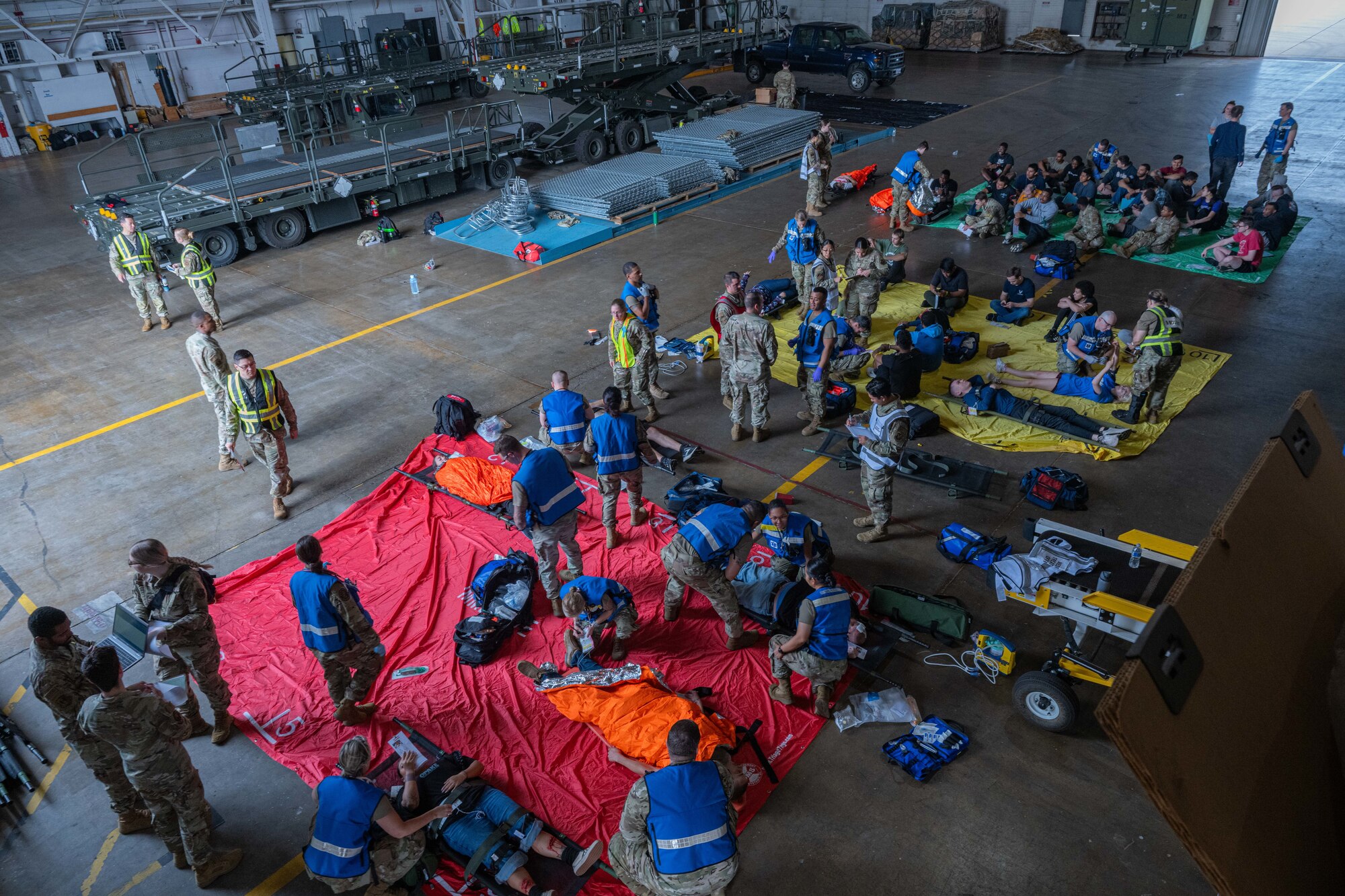 Airmen assigned to the 5th Medical Group operate a triage center during a major accident response exercise (MARE) at Minot Air Force Base, North Dakota, Aug. 21, 2024. MAREs provide realistic, hands-on training scenarios for first responders and enhance operational readiness in the event of a real-world incident. (U.S. Air Force photo by Senior Airman Kyle Wilson)