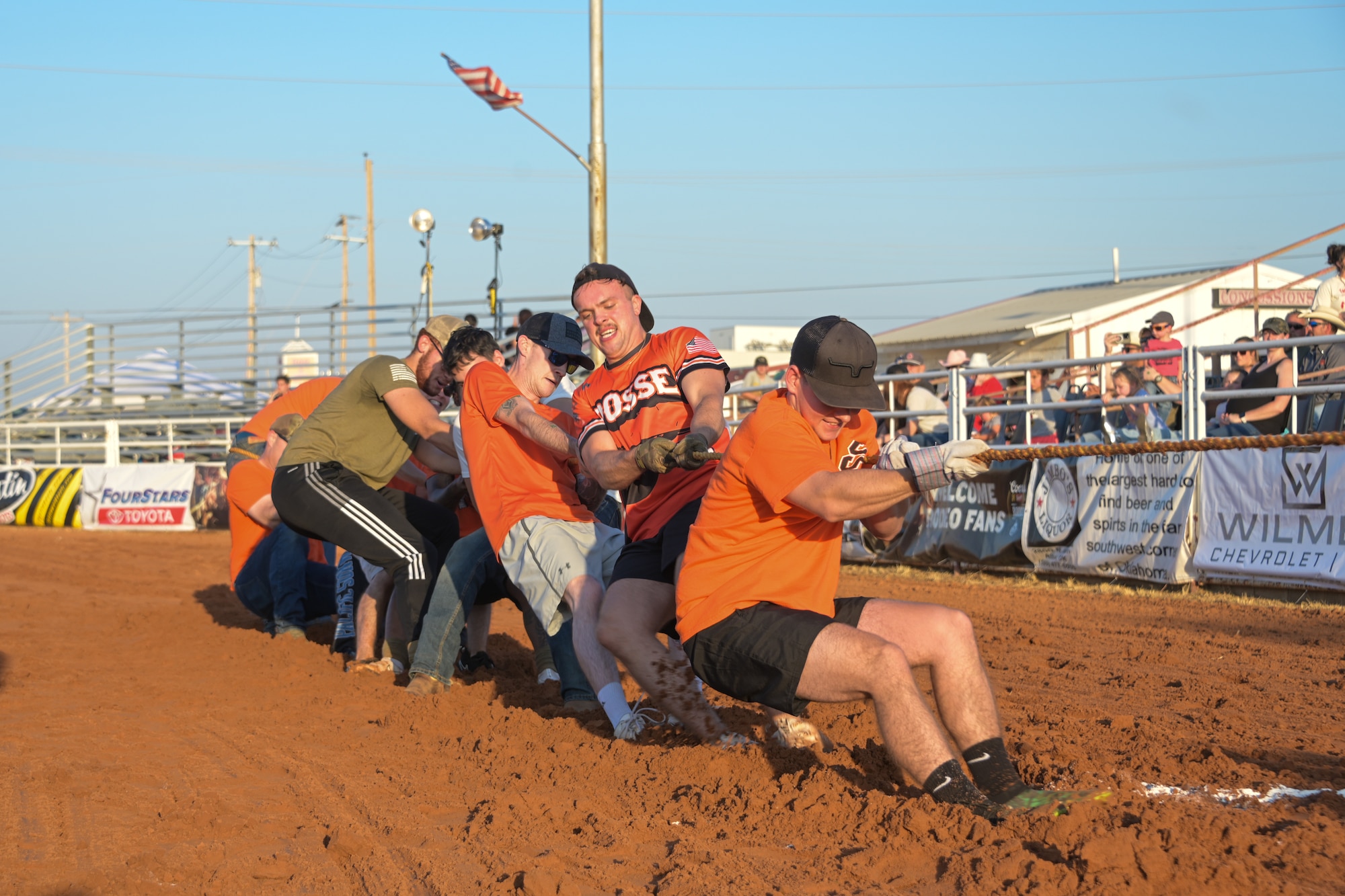 Members of the 97th Operational Support Squadron (OSS) dig in to win during the annual ‘Tug of War’ competition at the Great Plains Stampede Rodeo in Altus Oklahoma, Aug. 22, 2024. The 97th Training Squadron, 97th Security Forces Squadron, Altus Fire Department, and 97th OSS went head to head for the annual ‘Tug of War’ competition on military appreciation night.
(U.S. Air Force photo by Airman 1st Class Lauren Torres)