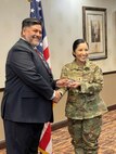 U.S. Air Force 1st Lt. Claudia Hinchey, 9th Medical Group resource management and commander’s support staff flight commander, was coined by the Defense Health Agency Director of J/6, after completing the Market Advance Course for Chief Information Officers at the DHA, Virginia, February 2023. (Courtesy Photo)