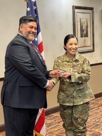 U.S. Air Force 1st Lt. Claudia Hinchey, 9th Medical Group resource management and commander’s support staff flight commander, was coined by the Defense Health Agency Director of J/6, after completing the Market Advance Course for Chief Information Officers at the DHA, Virginia, February 2023. (Courtesy Photo)