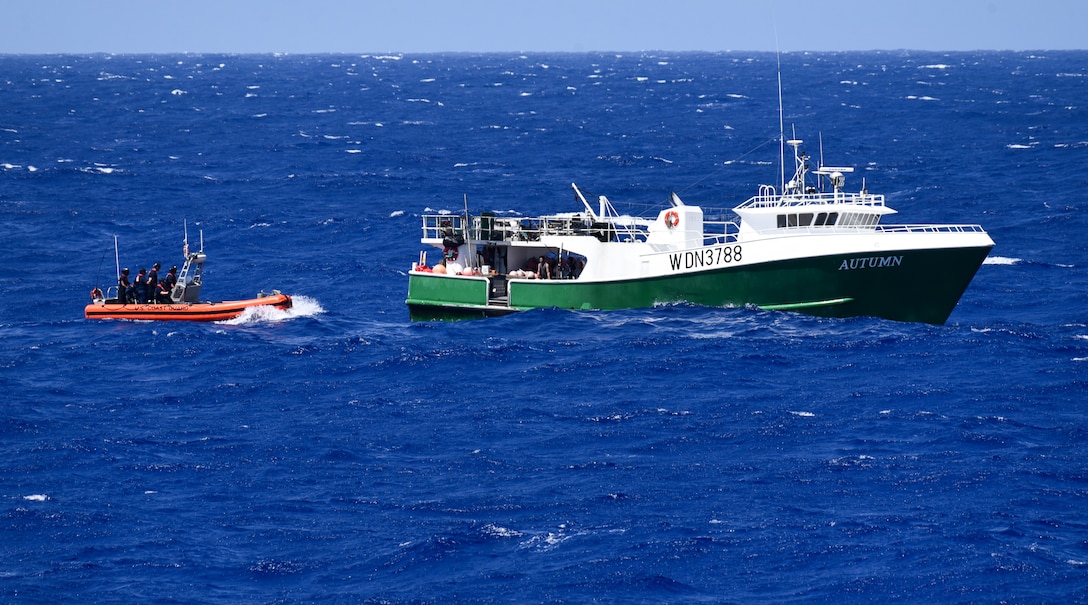 Coast Guard Cutter Harriet Lane small boat prepares to come alongside the commercial fishing vessel Autumn off the coast of Oahu Aug. 22, 2024.