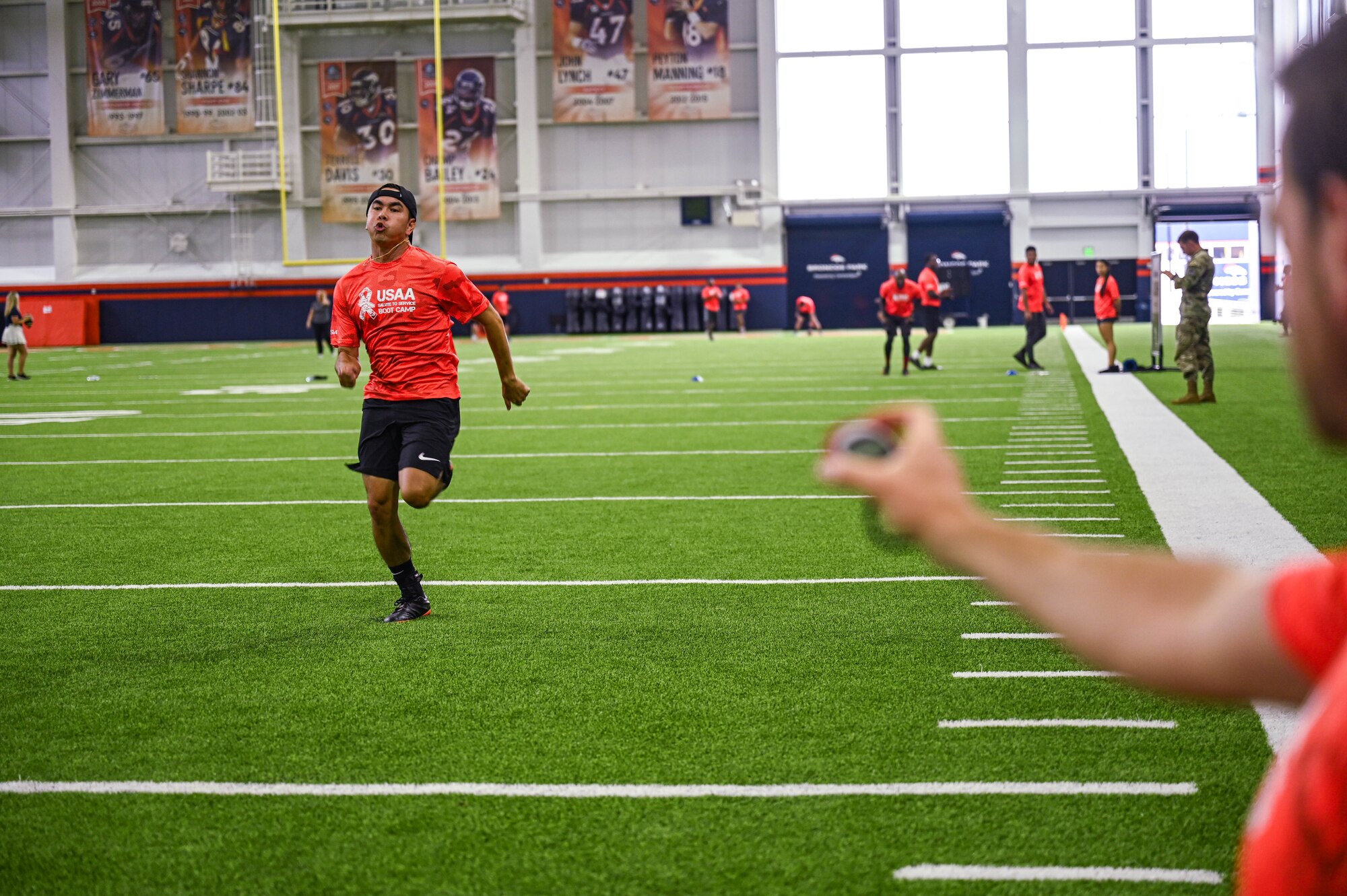 man running on football field