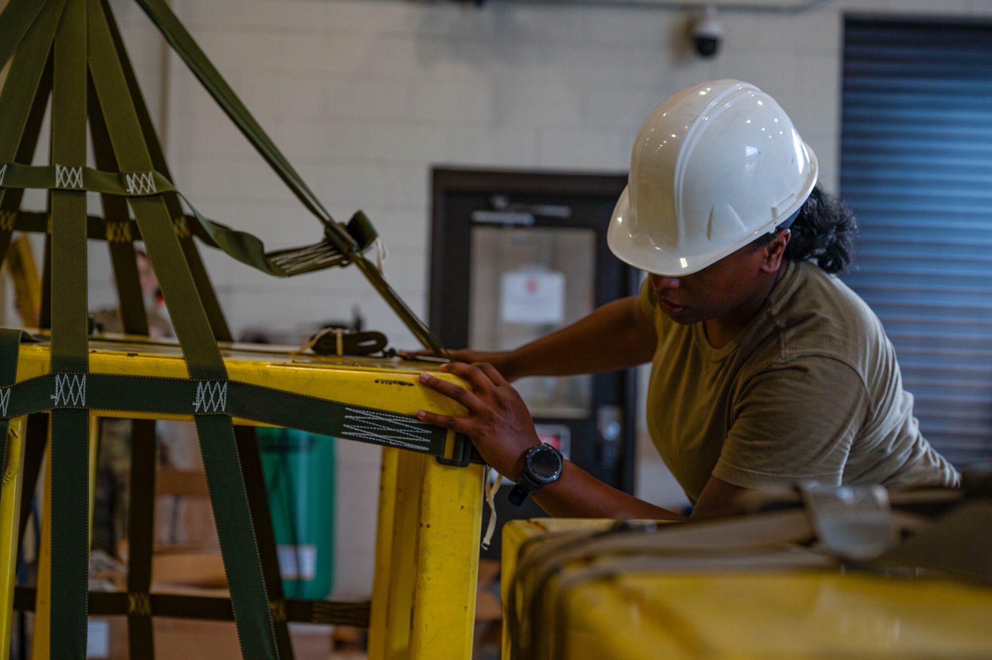 Air transportation specialists build pallets and implement necessary safety and security precautions for handling, storing and transporting materials.