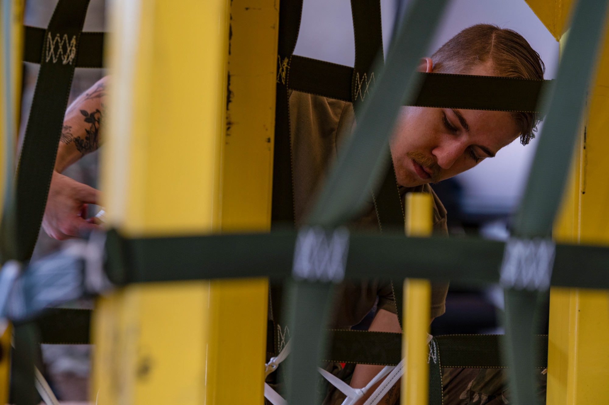 Air transportation specialists build pallets and implement necessary safety and security precautions for handling, storing and transporting materials.