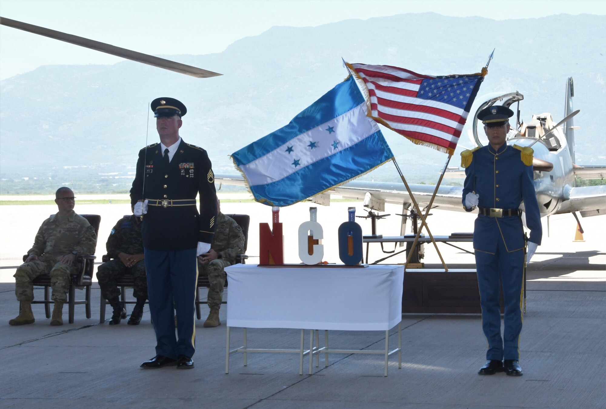 A photo of service members standing together.