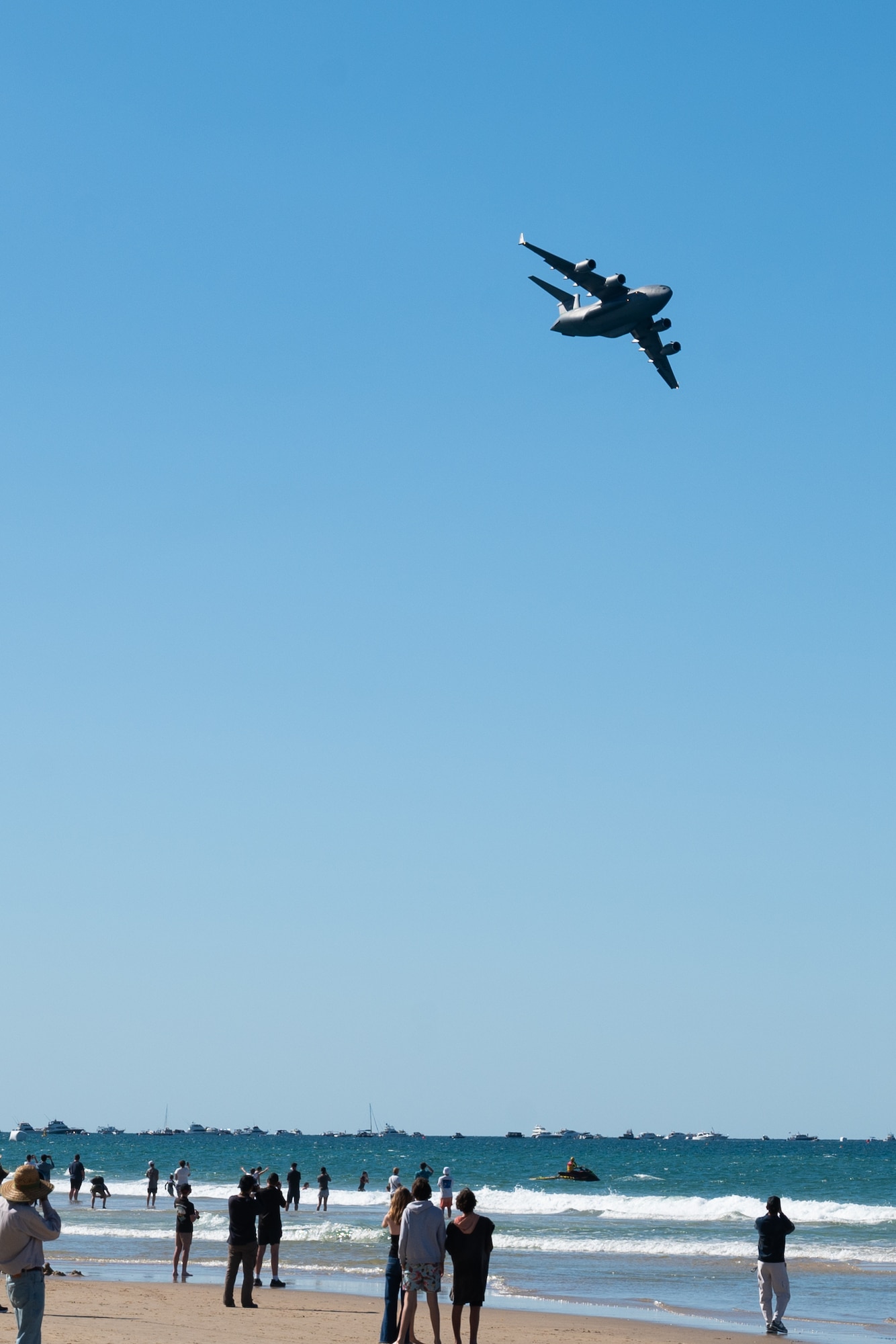 A U.S. Air Force C-17 Globemaster III assigned to the 446th Airlift Wing flies over the Pacific Airshow Gold Coast in Gold Coast, Australia, on Aug. 18th, 2024.