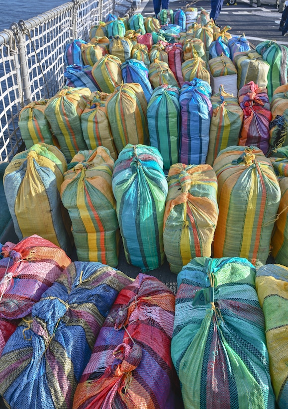 Bales of illegal narcotics, worth an estimated $50 million, are staged for an offload by crew members of U.S. Coast Guard Cutter Escanaba (WMEC 907) in Port Everglades, Florida, Aug. 23, 2024. Escanaba's crew worked alongside an embarked Coast Guard Helicopter Interdiction Tactical Squadron aircrew, Law Enforcement Detachment 107 from Coast Guard Tactical Law Enforcement Team Pacific, and interagency and international partners to interdict illicit narcotics in the international waters of the Eastern Pacific Ocean. (U.S. Coast Guard photo by Petty Officer 3rd Class Eric Rodriguez)