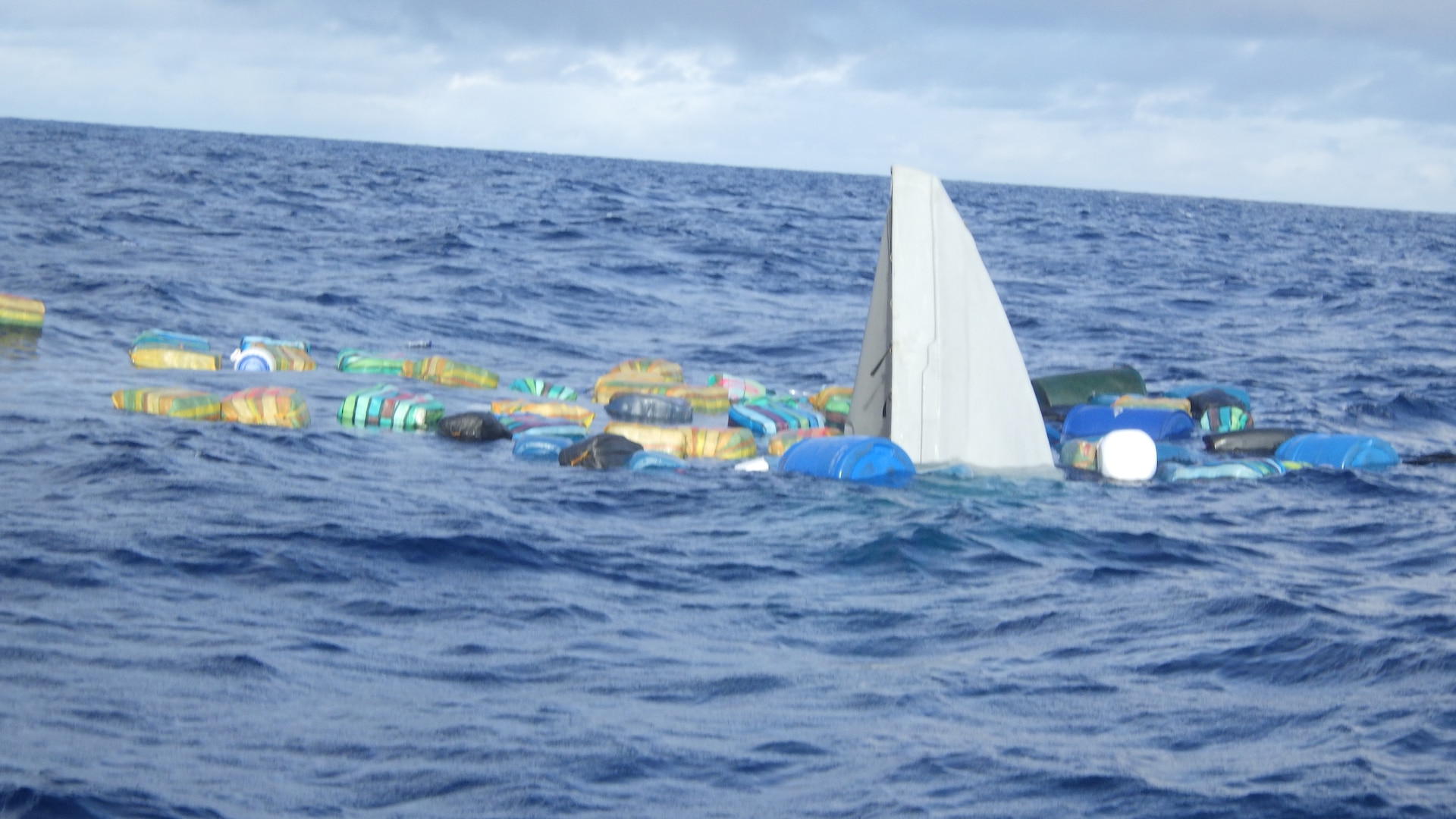 A U.S. Coast Guard Cutter Escanaba (WMEC 907) boat crew, Coast Guard law enforcement detachment 107, and Coast Guard Helicopter Interdiction Tactical Squadron aircrew interdict a go-fast vessel in the Eastern Pacific Ocean, Aug. 3, 2024. The crew of USCGC Escanaba offloaded more than 3,400 pounds of cocaine and 4,410 pounds of marijuana with a combined assessed street value of approximately $50 million in Port Everglades, Florida, Aug. 23, 2024. (U.S. Coast Guard photo by Petty Officer 2nd Class Samuel Handy)