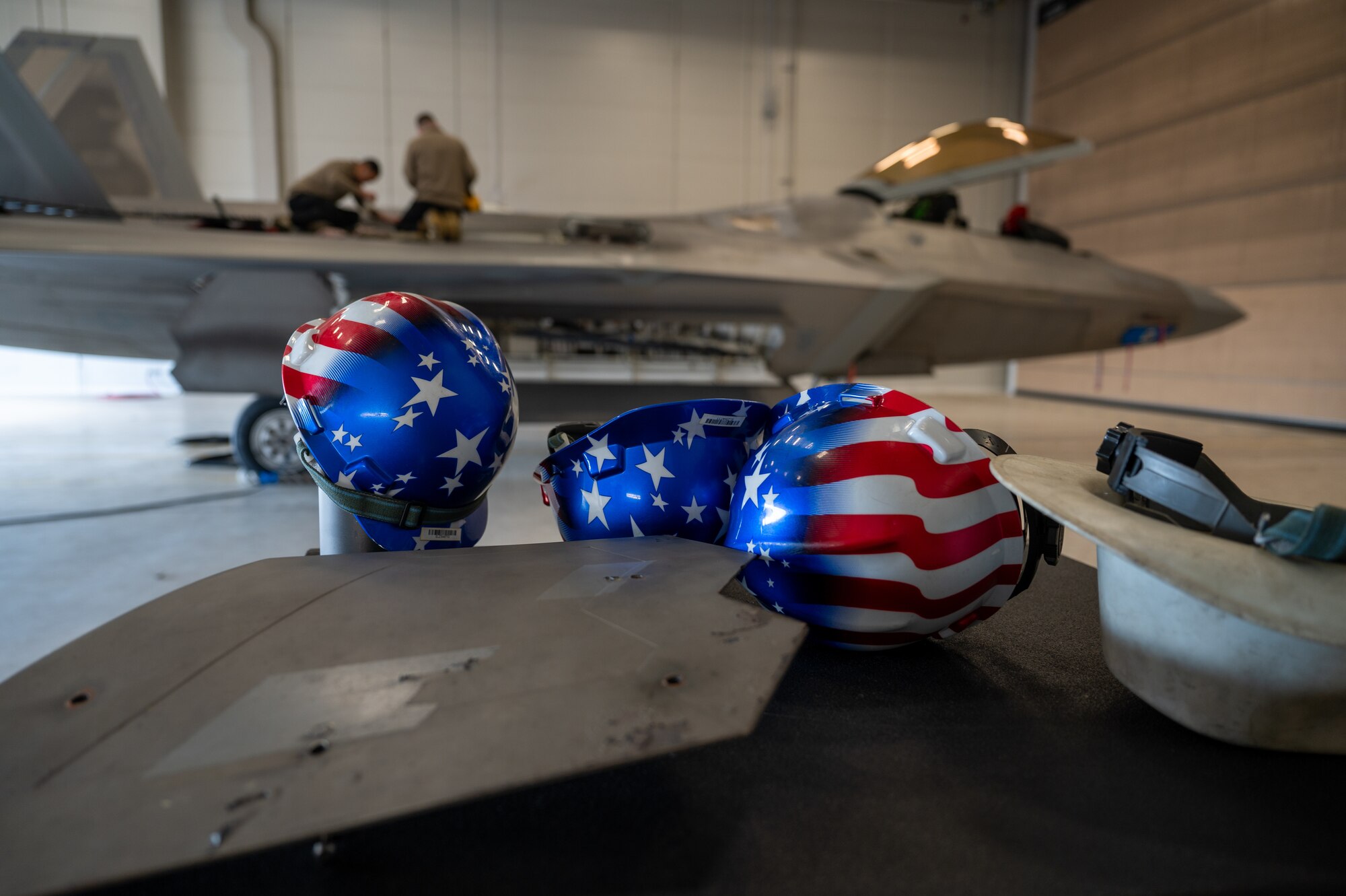Helmets belonging to the 525th Fighter Generation Squadron sit atop a toolbox during Red Flag-Alaska 24-3 at Joint Base Elmendorf-Richardson, Alaska, Aug. 22, 2024.