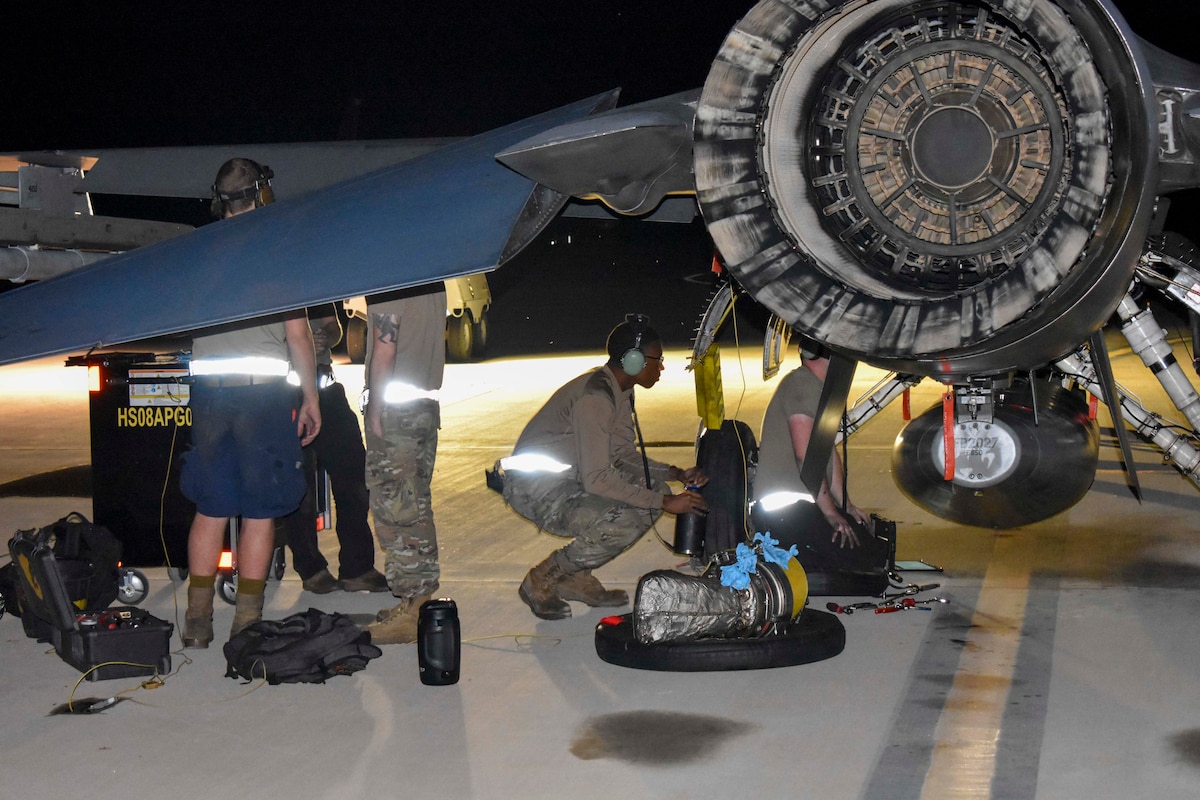 Airmen of the 49th Maintenance Group replace jet fuel starter on an F-16 Viper during Project Iron Agility at Holloman Air Force Base, New Mexico, Aug. 13, 2024. The maintenance knowledge curriculum taught at PIA implements training tactics and procedures to prepare Airmen for deployment scenarios. (Courtesy photo)